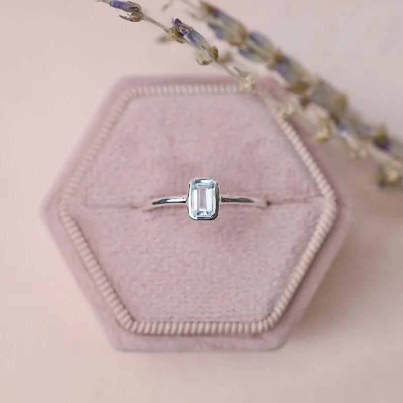 Vertical Bezel Set Emerald Cut Aquamarine Ring