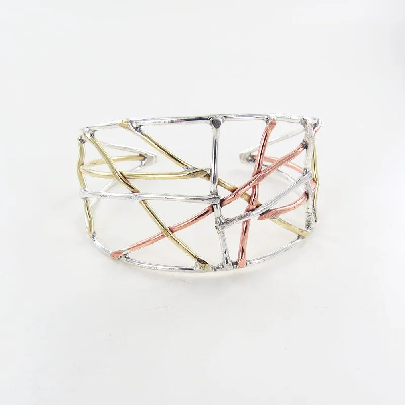 CRISS CROSS STICK CUFF